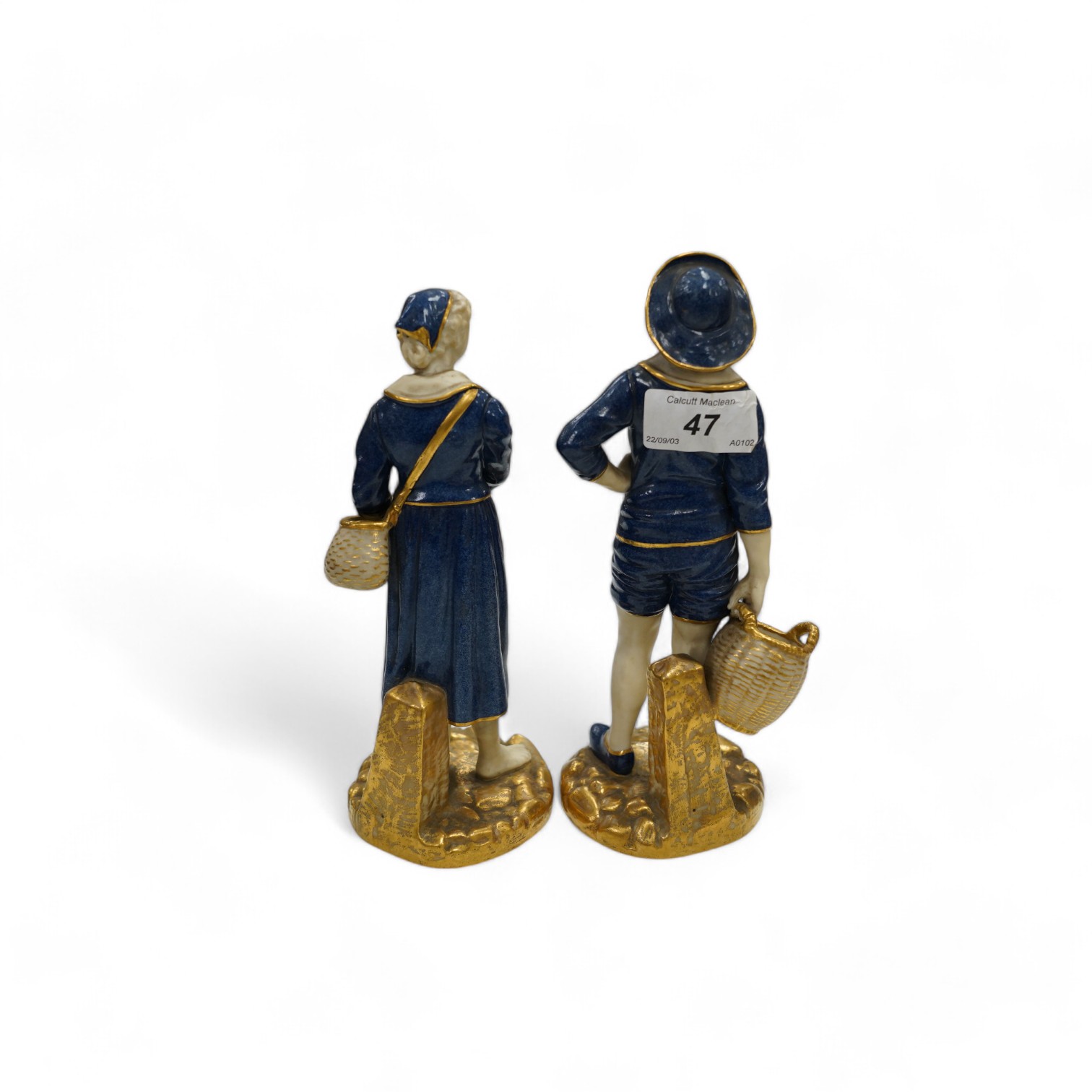 A pair of Worcester figures, fisherfolk, model number 1202, 21cm. Condition - good, some minor wear to gilding